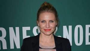 Cameron Diaz holding a sign posing for the camera: ‘The Other Woman’ star doesn’t believe that humans are “naturally” suited to just one person but have been taught to find someone special to be with.  She told InStyle in 2014: "I don't know if anyone is really naturally monogamous. We all have the same instincts as animals. But we live in a society where it's been ingrained in us to do these things."
