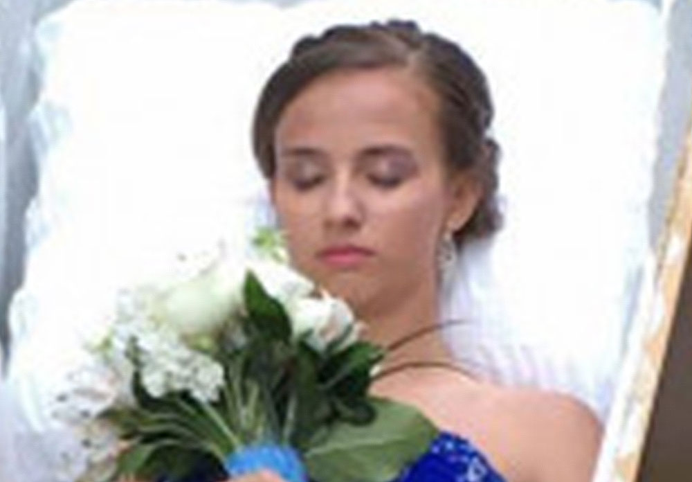 Girl shows prom coffin
