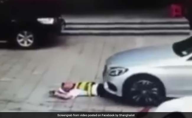 drives over guard parking spot