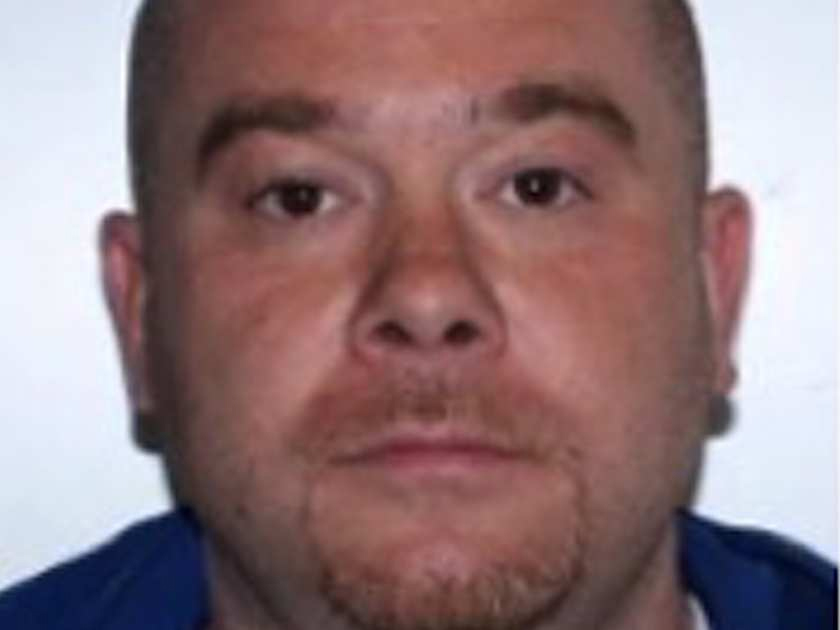 Police searching "armed dangerous" suspect