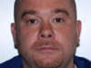Police searching "armed dangerous" suspect