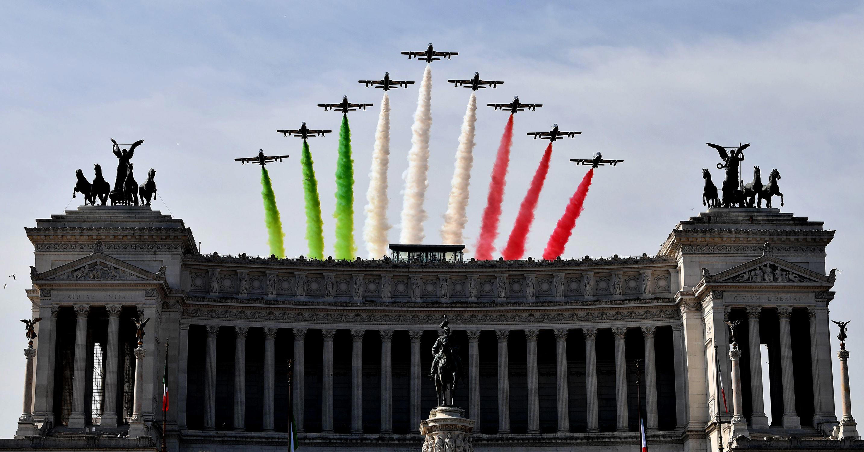 Slide 1 of 96: The Italian Air Force aerobatic unit Frecce Tricolori (Tricolor Arrows) spreads smoke with the colors of the Italian flag over the Vittoriano Monument, on June 2, 2017 in Rome during the Republic Day ceremony. / AFP PHOTO / Marie-Laure MESSANA        (Photo credit should read MARIE-LAURE MESSANA/AFP/Getty Images)