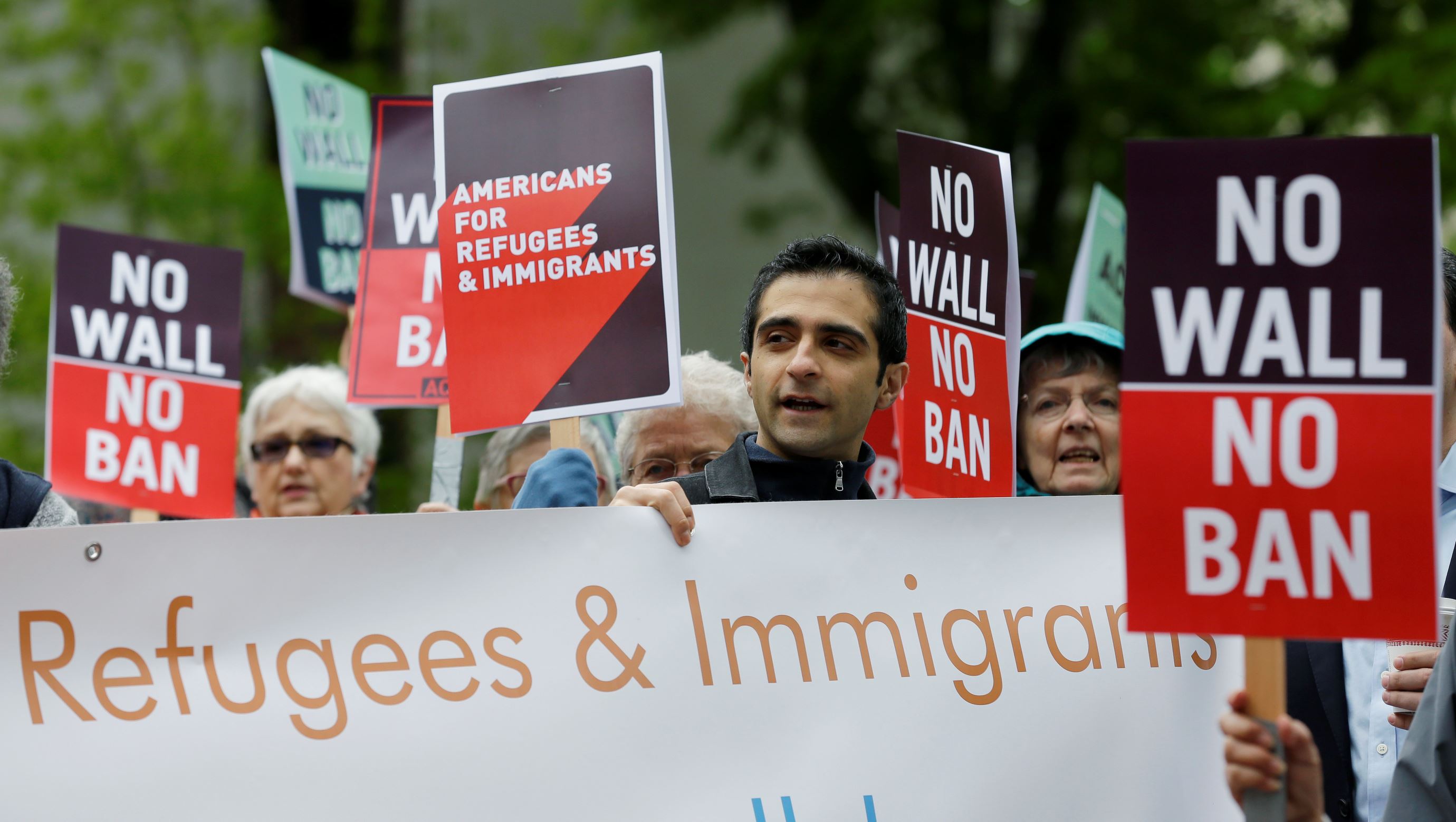 U.S. court lets Trump travel ban go partially into effect