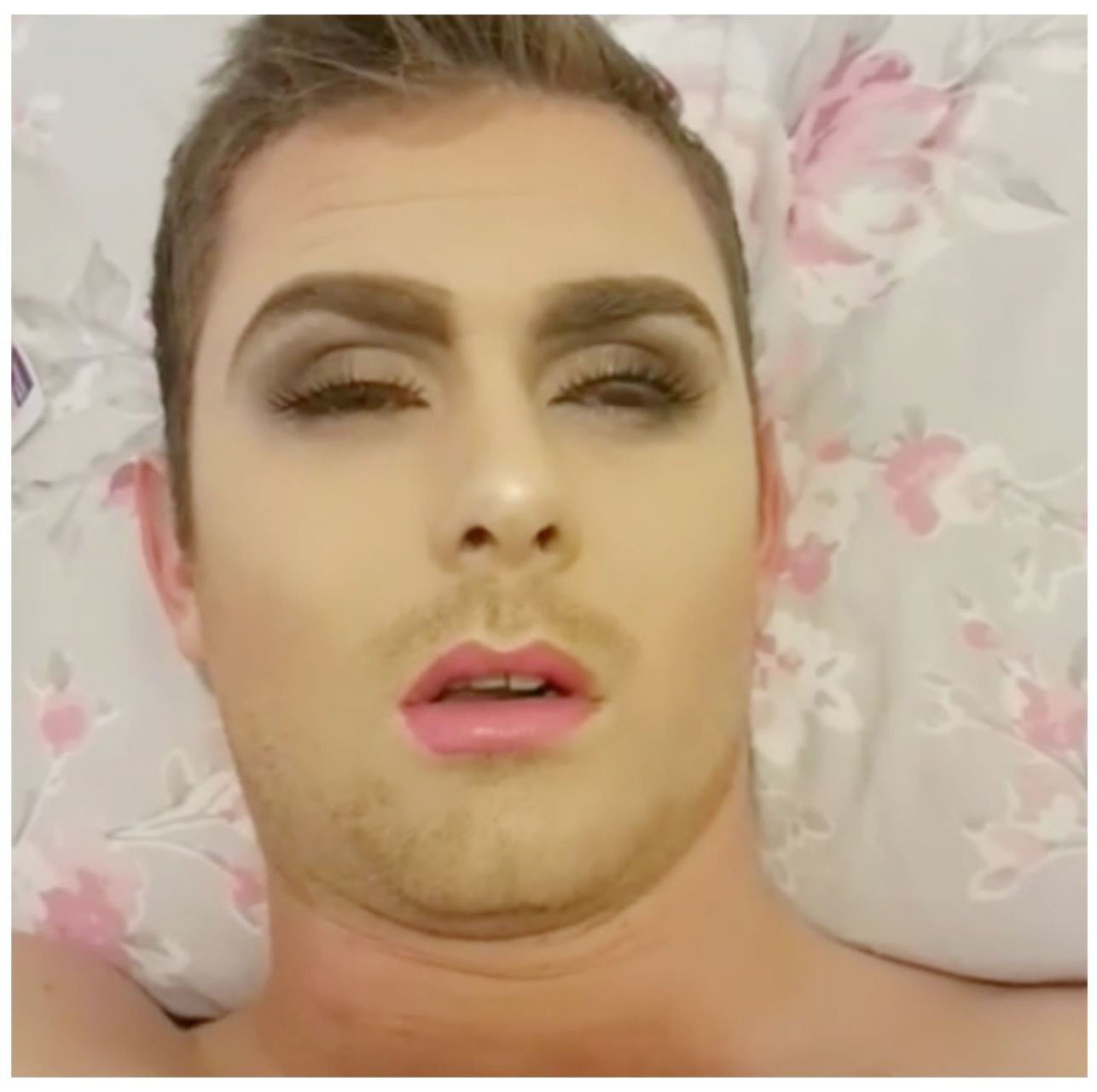 Woman gives sleeping boyfriend hilarious