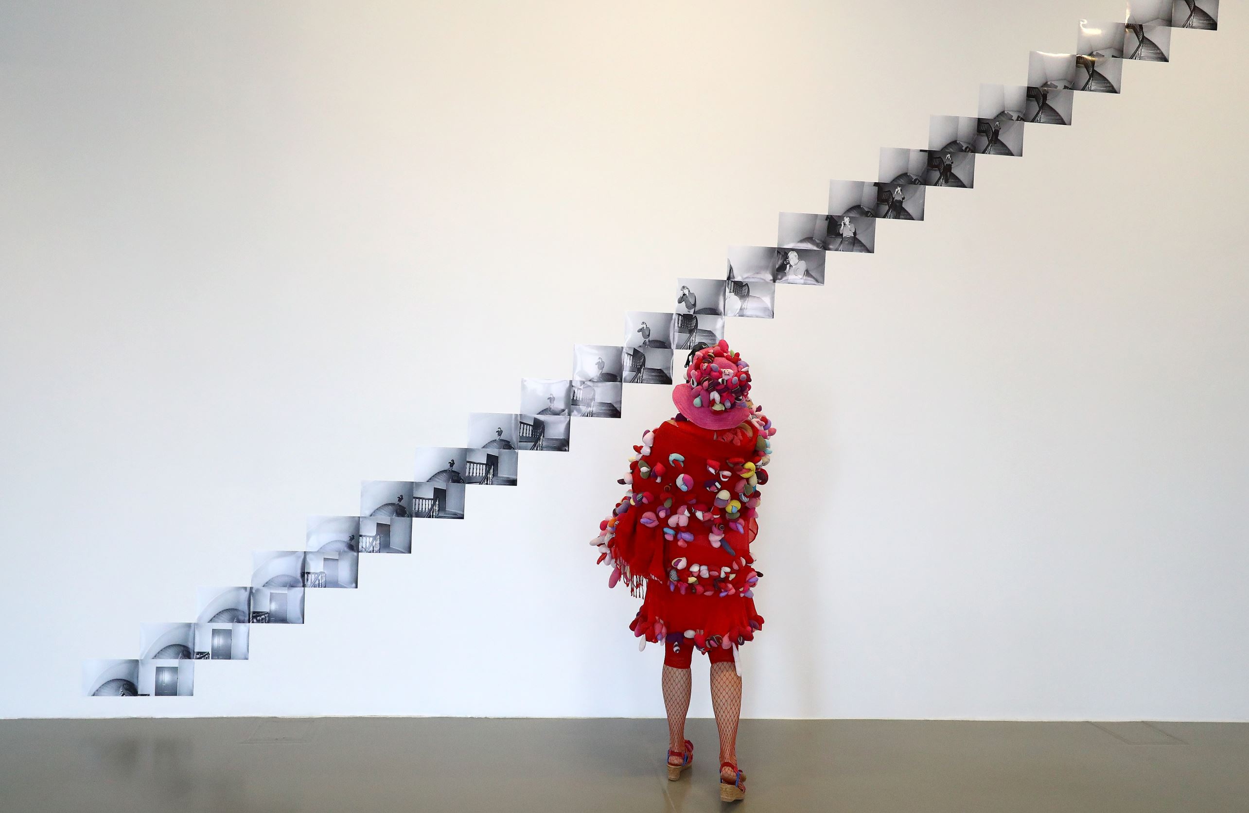 Slide 34 de 36: Artist Alexandra Fly looks at "Brabantdam 59, Gent, Downstairs-Upstairs" project by artist Danny Matthys displayed at Fridericianum gallery ahead of the opening of Germany's biggest art fair "Documenta 14" in Kassel, Germany, June 7, 2017.