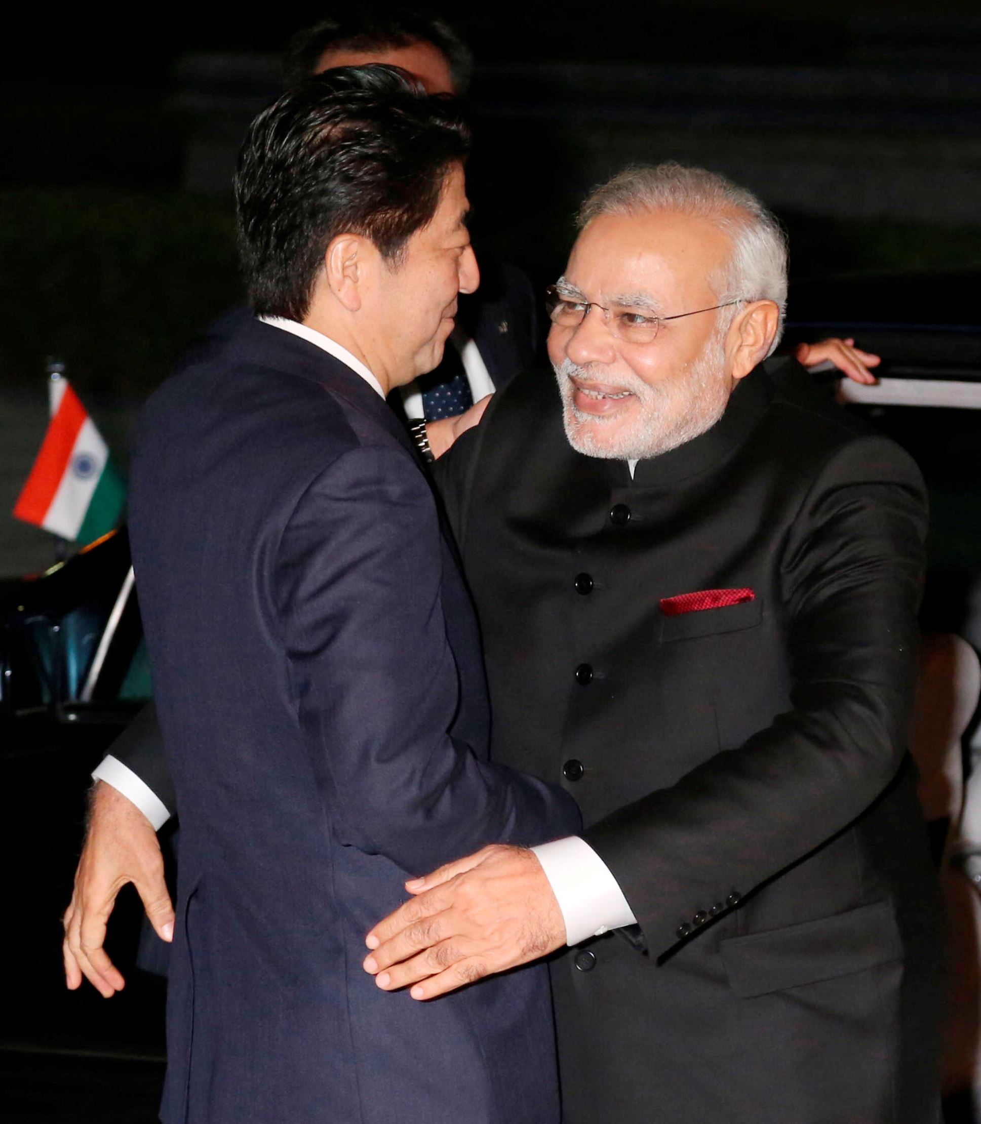 Modi embraces world with 'bear