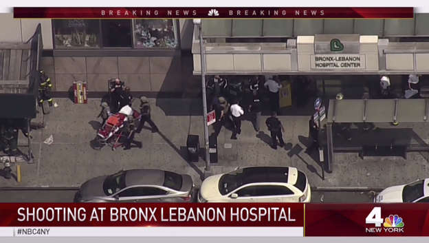 In this image taken from video provided by WNBC 4 New York, emergency personnel converge on Bronx Lebanon Hospital in New York, after a gunman opened fire there on Friday, June 30, 2017.