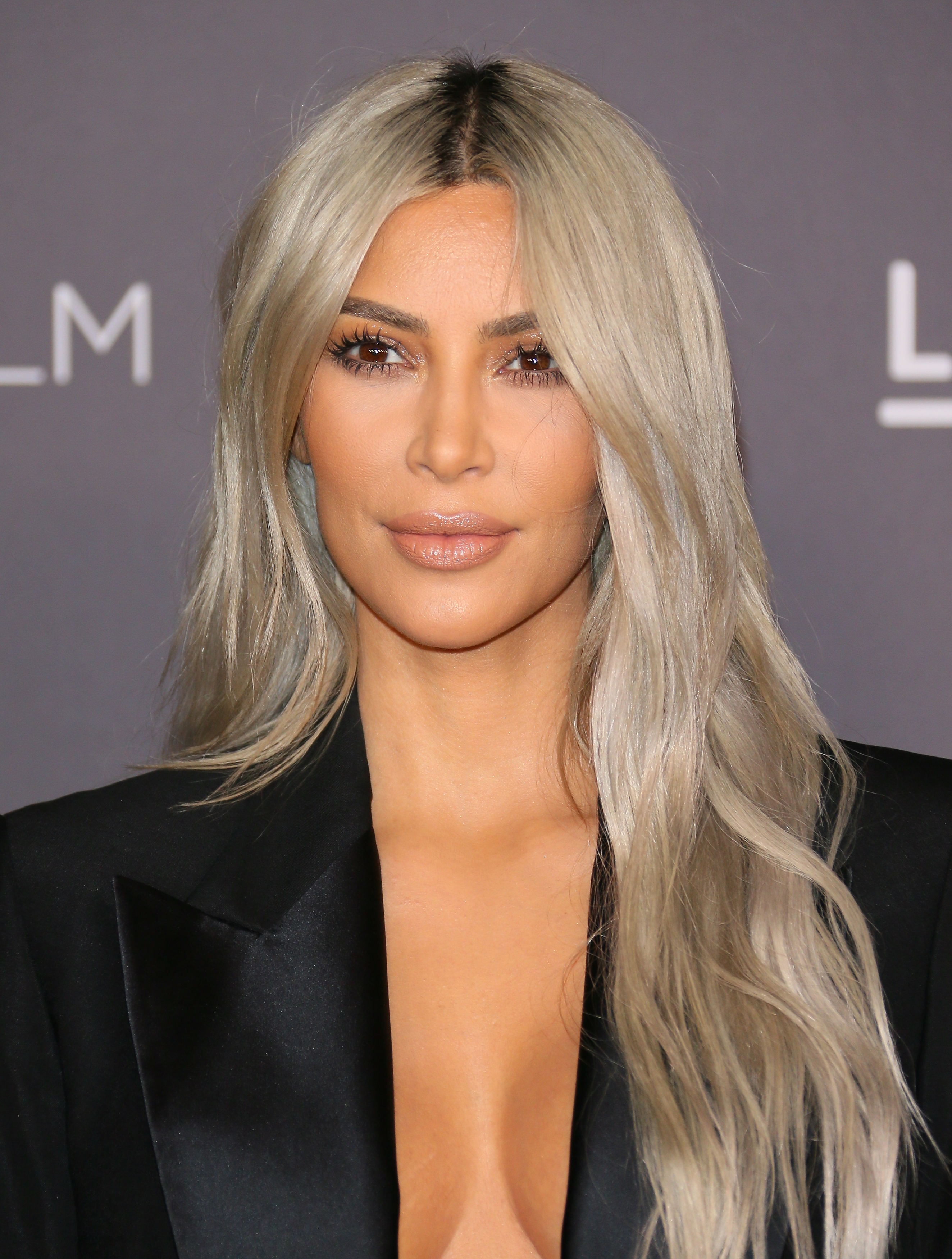 Kim's revealing tuxedo jacket fashion