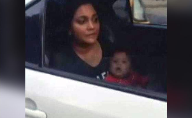 Mumbai Police with woman breastfeeding