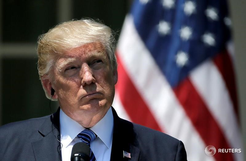 Trump says unaware son's meeting