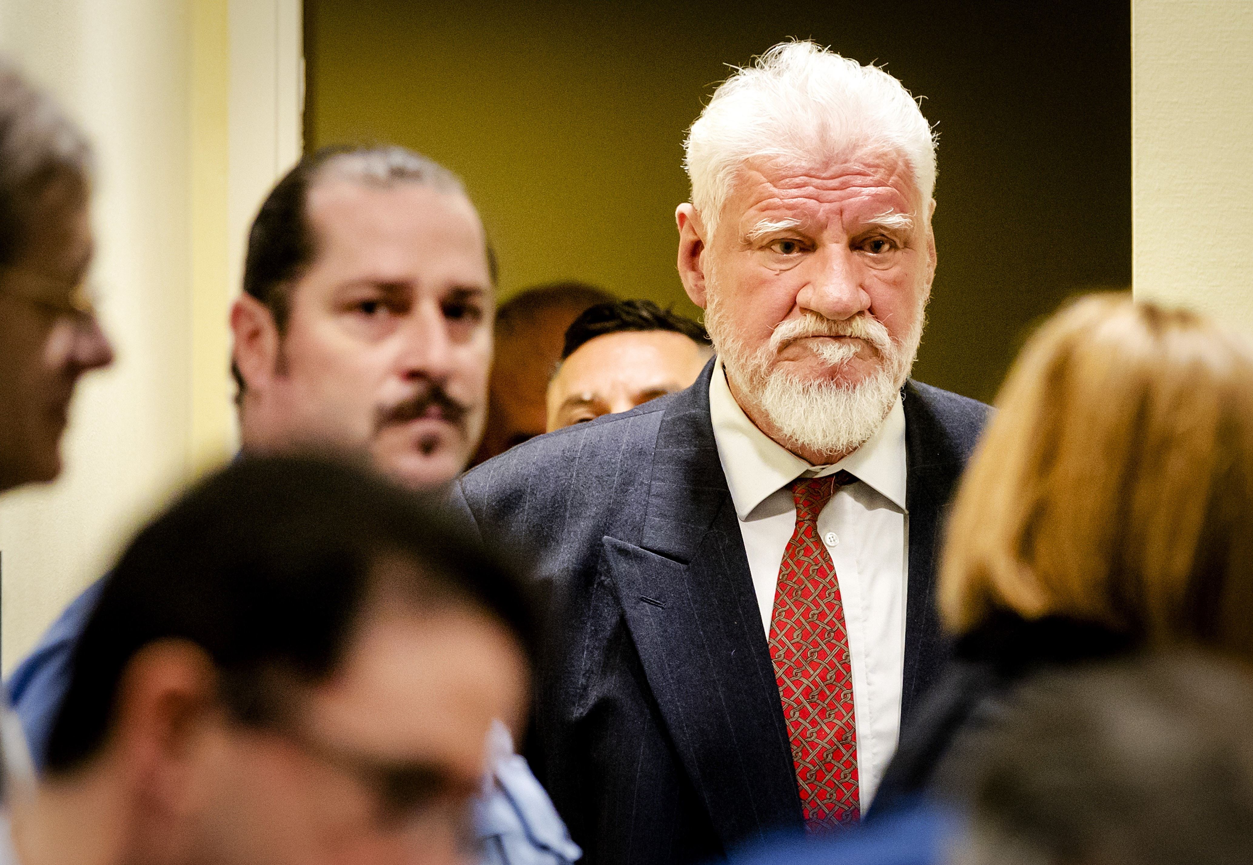 Bosnian Croat war crimes convict dies after taking 'poison' in U.N. court
