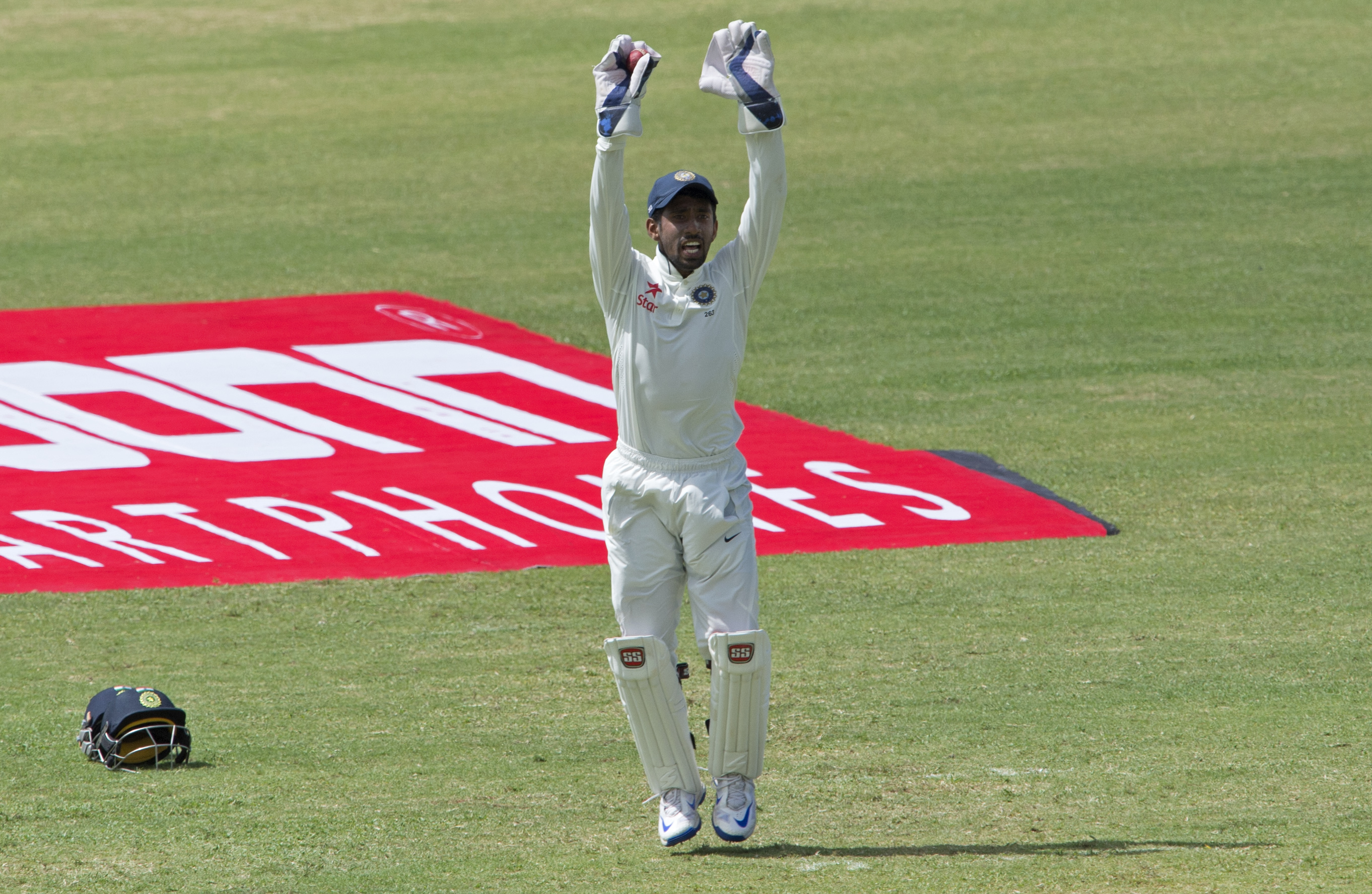 Saha playing Test