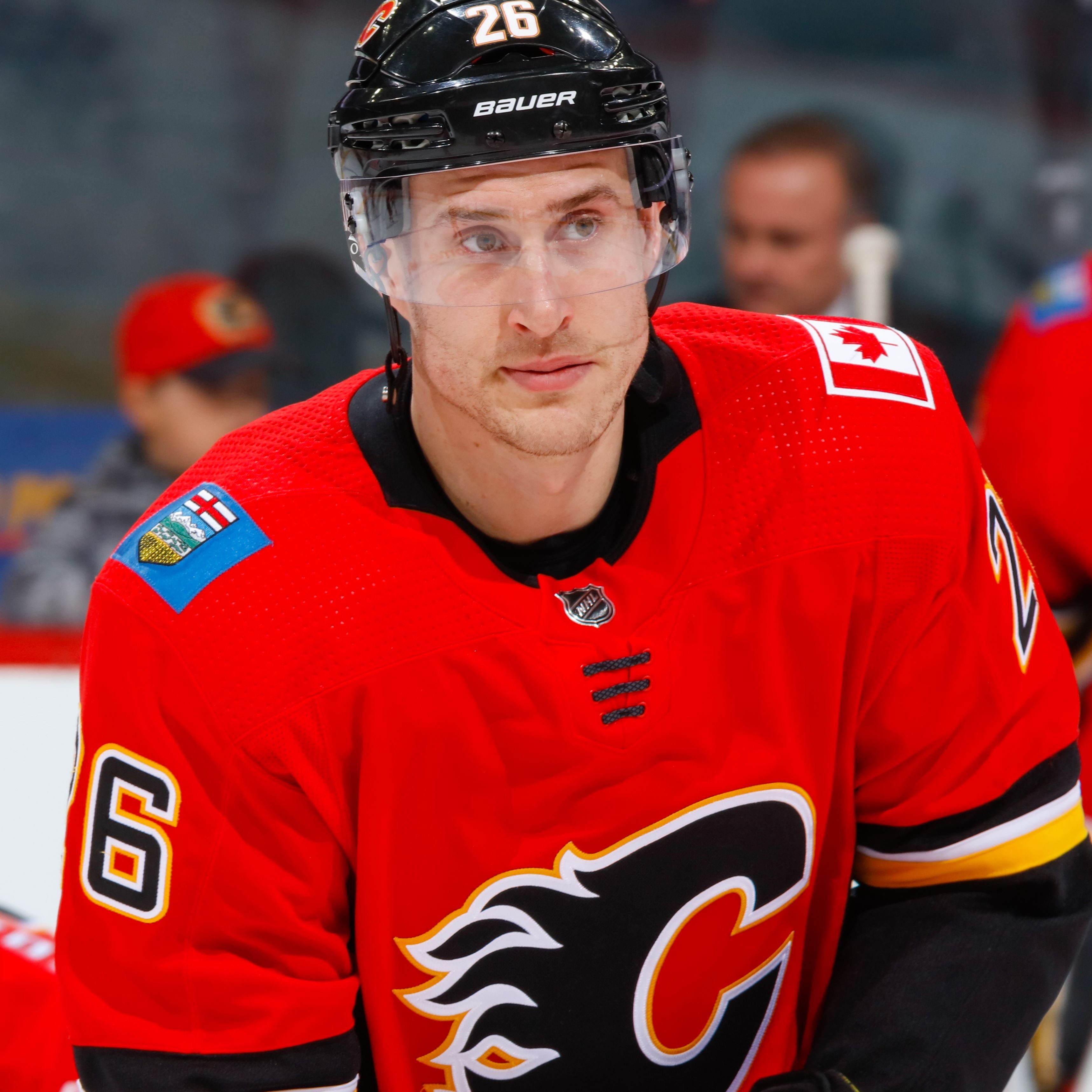 Stone scores late Flames Blackhawks