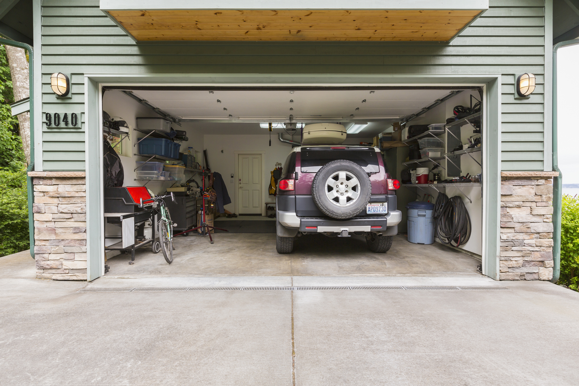 gives controversial open garage door