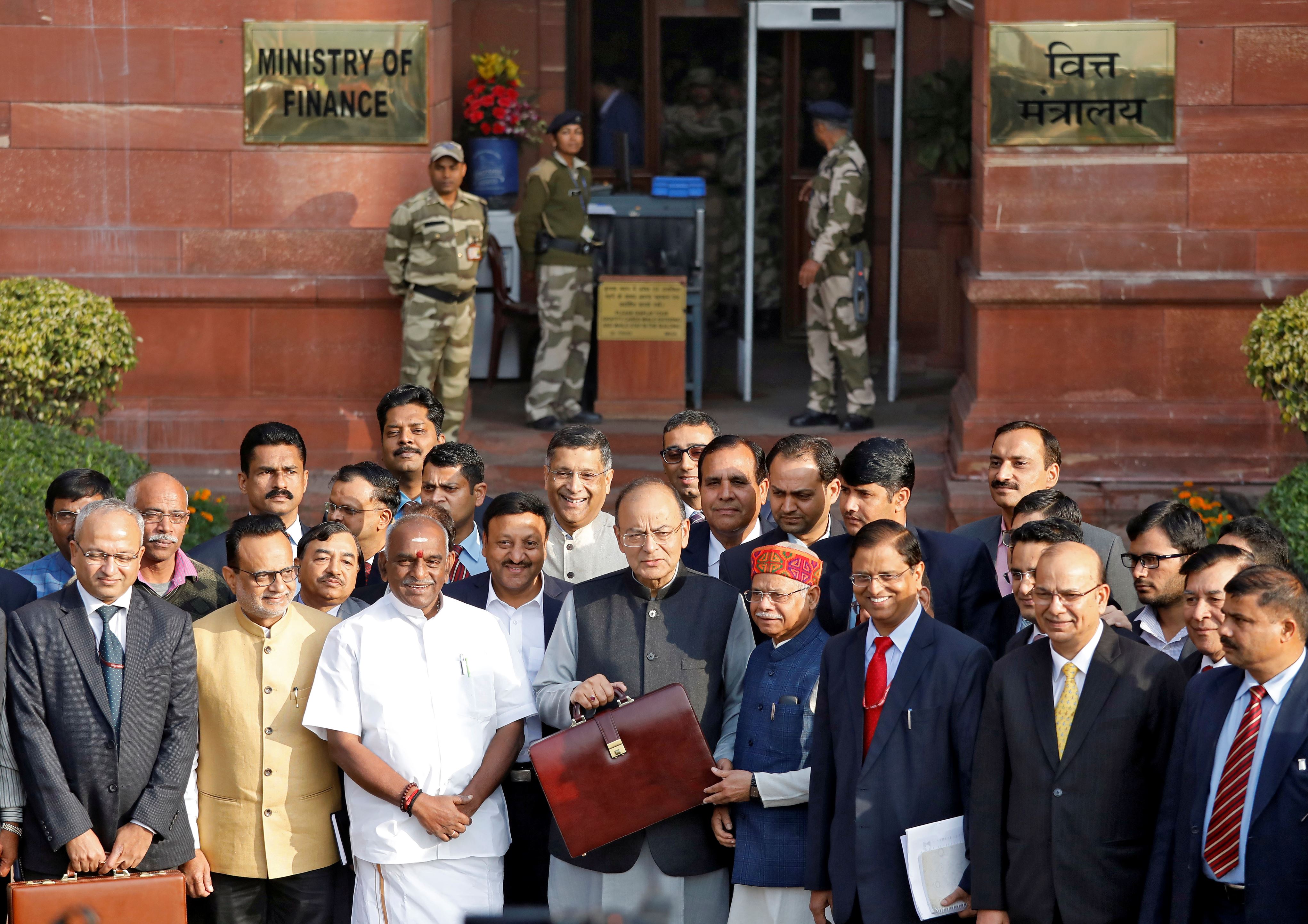 Finance minister Arun Jaitley shows