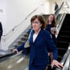 Sen. Susan Collins, R-Maine, takes the escalator on Capitol Hill, Wednesday, Oct. 3, 2018 in Washington.
