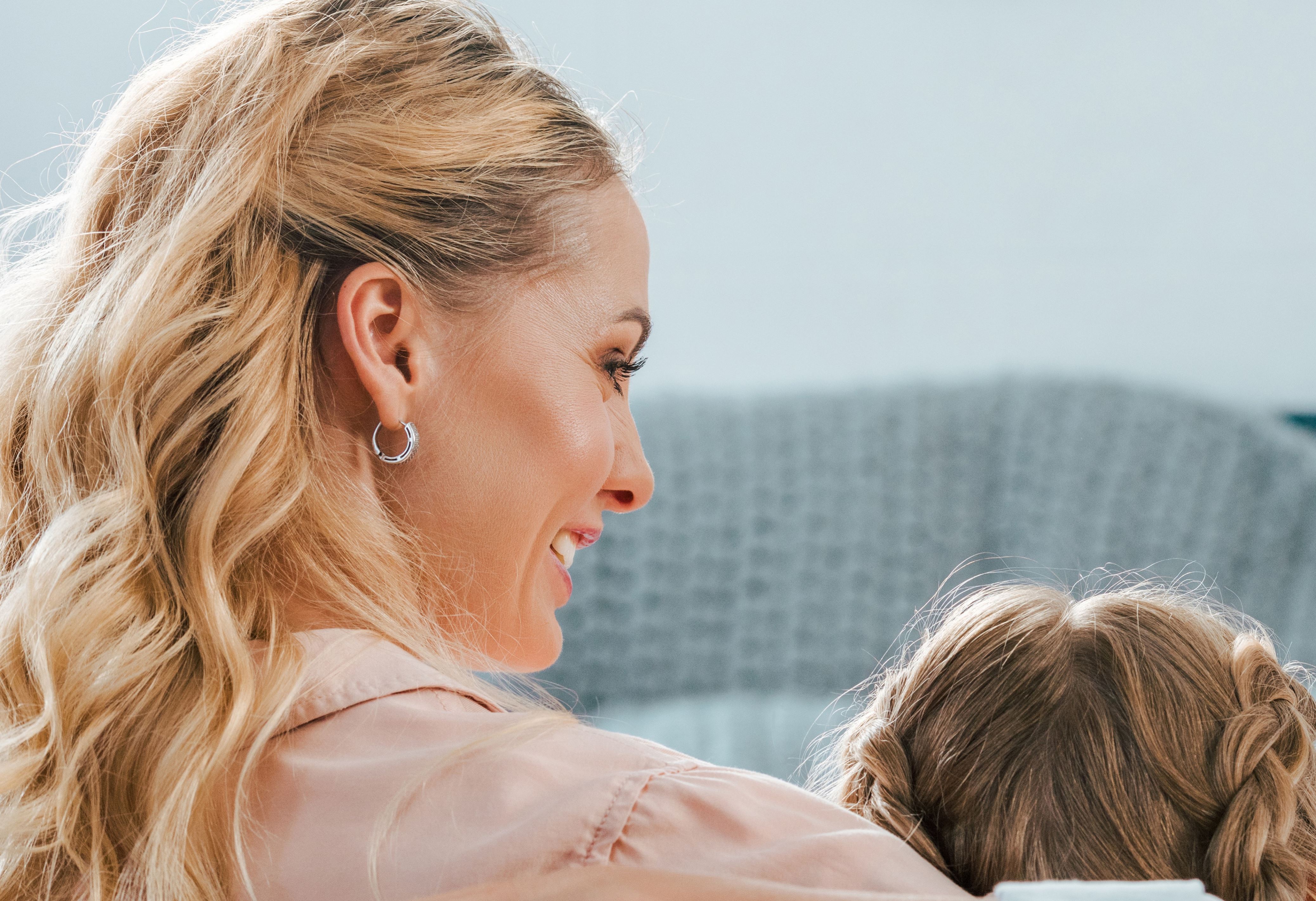 Child with mother sitting