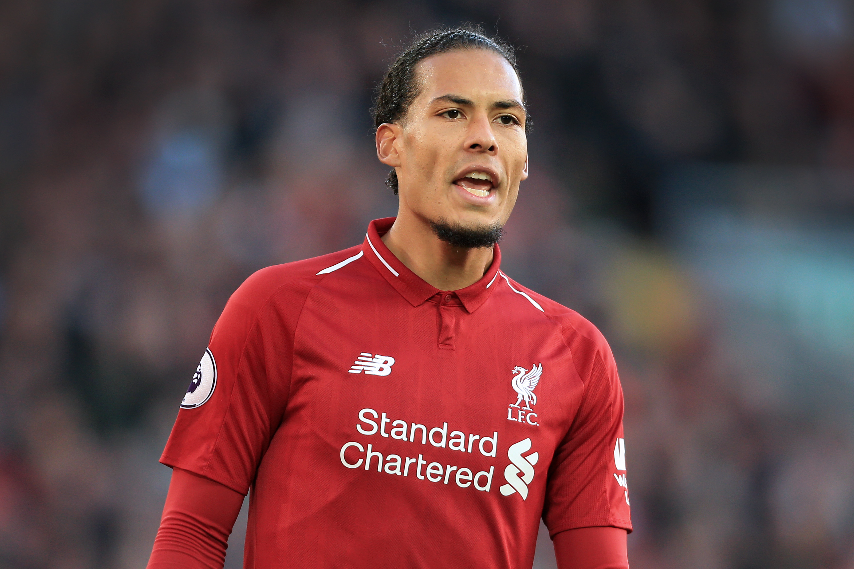 Virgil van Dijk of Liverpool gestures during the Premier League match between Liverpool and Cardiff City at Anfield on October 27, 2018 in Liverpool, United Kingdom.