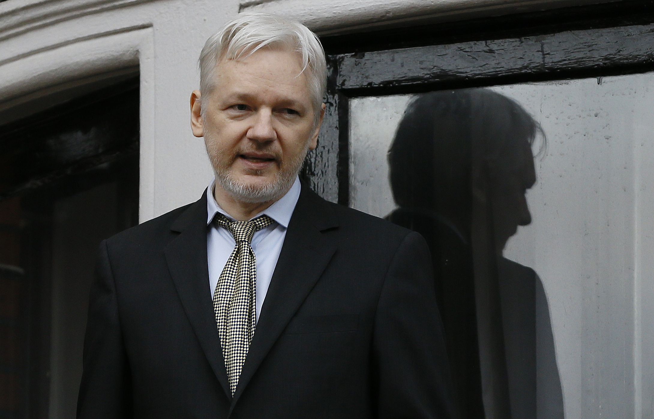 FILE - In this Feb. 5, 2016 file photo, WikiLeaks founder Julian Assange speaks from the balcony of the Ecuadorean Embassy in London. Sweden's top prosecutor said Friday May 19, 2017, she is dropping an investigation into a rape claim against WikiLeaks founder Julian Assange after almost seven years. (AP Photo/Kirsty Wigglesworth, File)