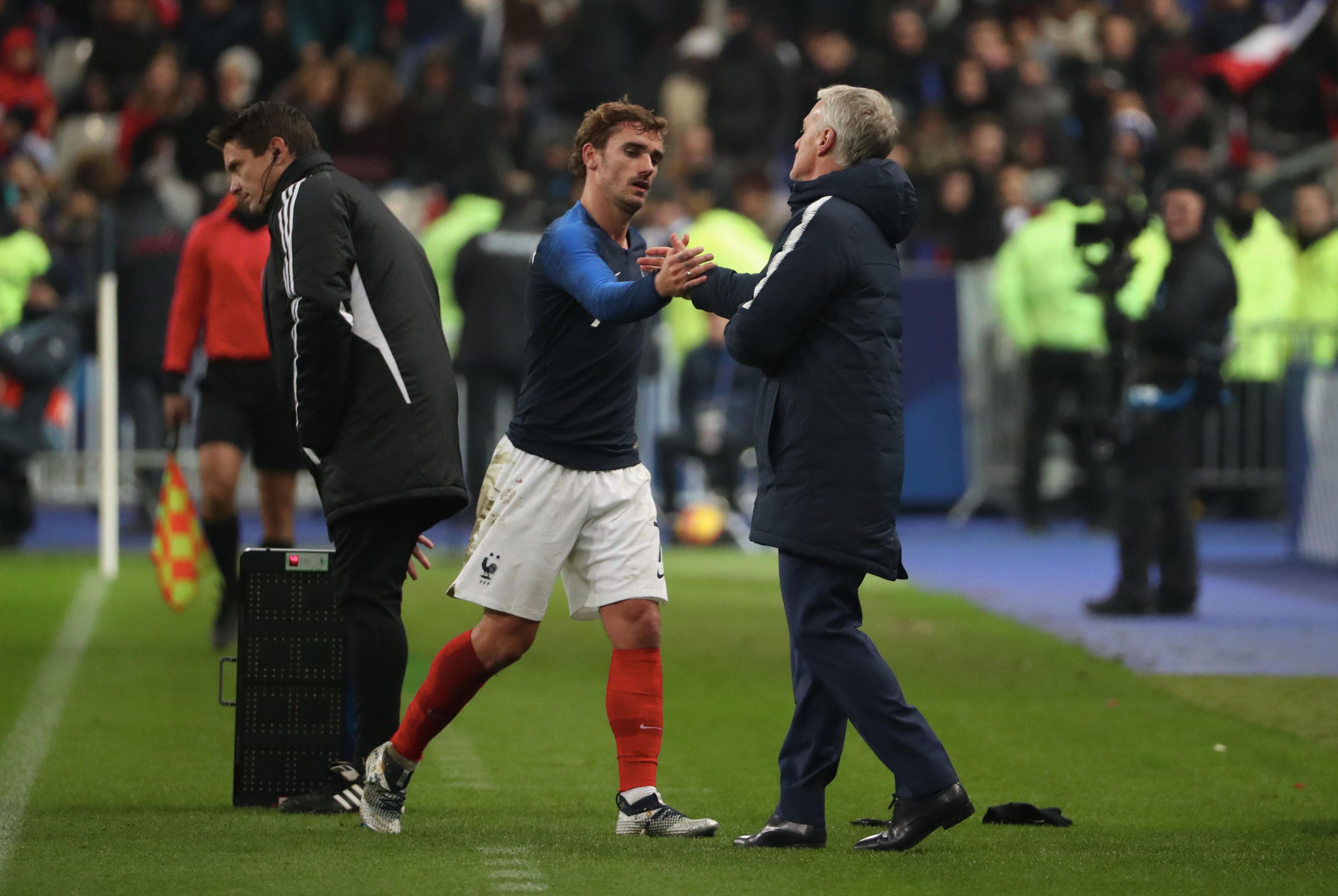 PARIS, FRANCE - NOVEMBER 20:  Head coach Didier Deschamps of France react with Antoine Griezmann during the International Friendly match between France and Uruguay at Stade de France on November 20, 2018 in Paris, France.  (Photo by Xavier Laine/Getty Images)