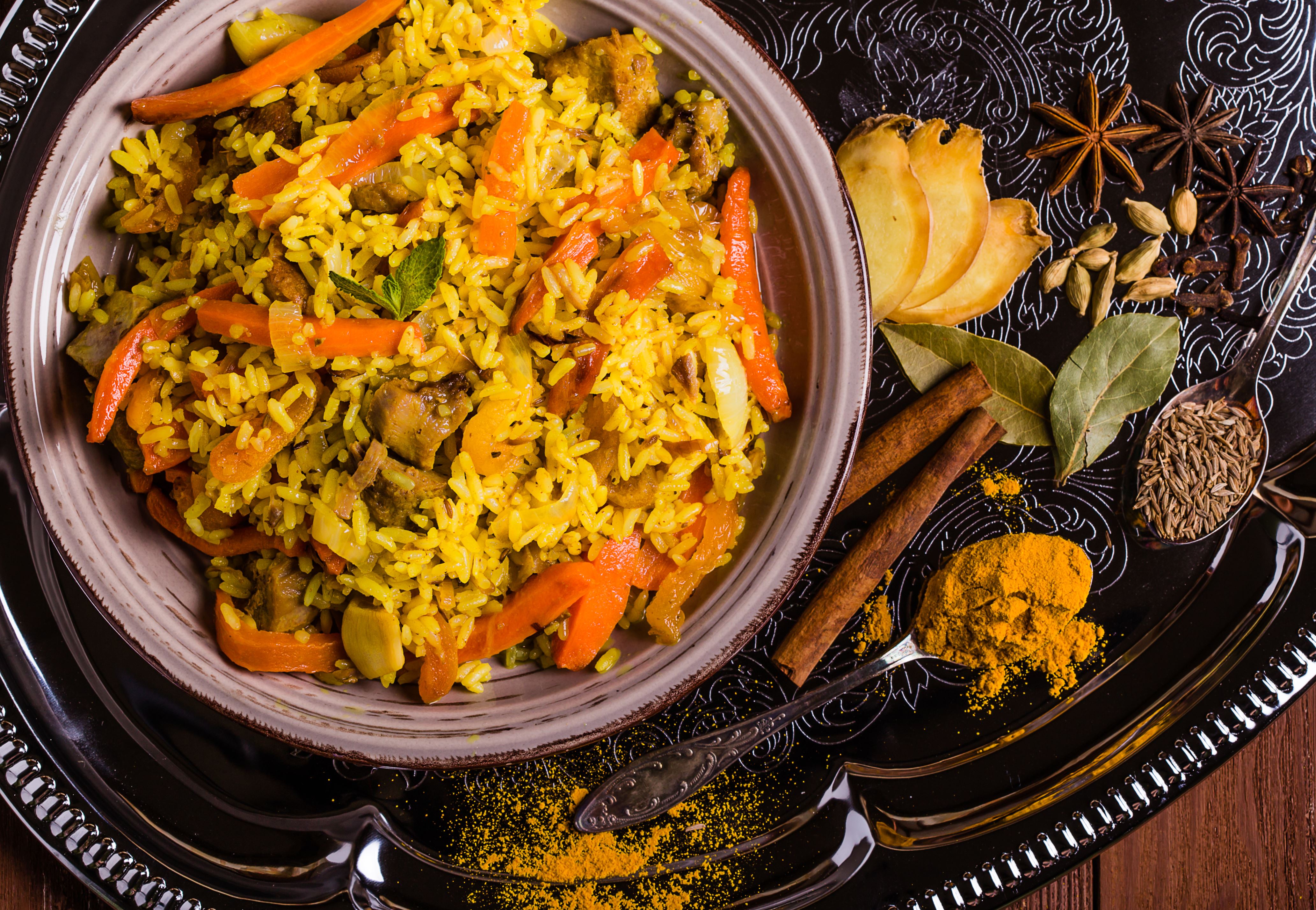 Indian Biryani with chicken and spices in traditional style