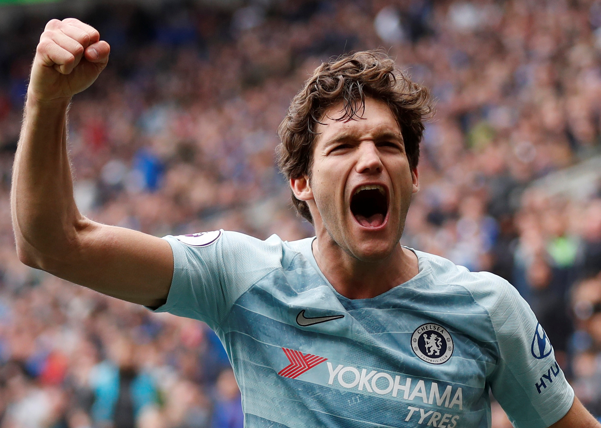 Soccer Football - Premier League - Cardiff City v Chelsea - Cardiff City Stadium, Cardiff, Britain - March 31, 2019  Chelsea's Marcos Alonso celebrates their second goal scored by Ruben Loftus-Cheek                        Action Images via Reuters/Matthew Childs  EDITORIAL USE ONLY. No use with unauthorized audio, video, data, fixture lists, club/league logos or "live" services. Online in-match use limited to 75 images, no video emulation. No use in betting, games or single club/league/player publications.  Please contact your account representative for further details.