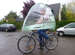 Frenchman Arnaud Sarfati has created a quirky canopy weighing 2.5 kg that unfolds over a bicycle rider and protect him from the rain.
