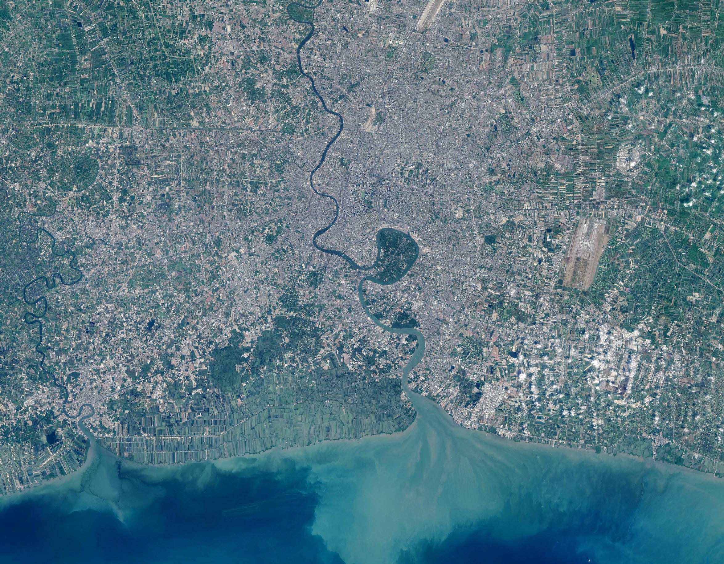 In the heart of Thailand’s most populous city, an oasis stands out from the urban landscape like a great “green lung.” That’s the nickname given to Bang Kachao—a lush protected area that has escaped the dense development seen elsewhere in Bangkok.

The city is built on the alluvial plain of the Chao Phraya River. Toward the southern end, near the Gulf of Thailand, is an old meander that never quite formed an oxbow lake. That meander traces the boundary of Bang Kachao, which TIME magazine once called the “best urban oasis” in Asia.