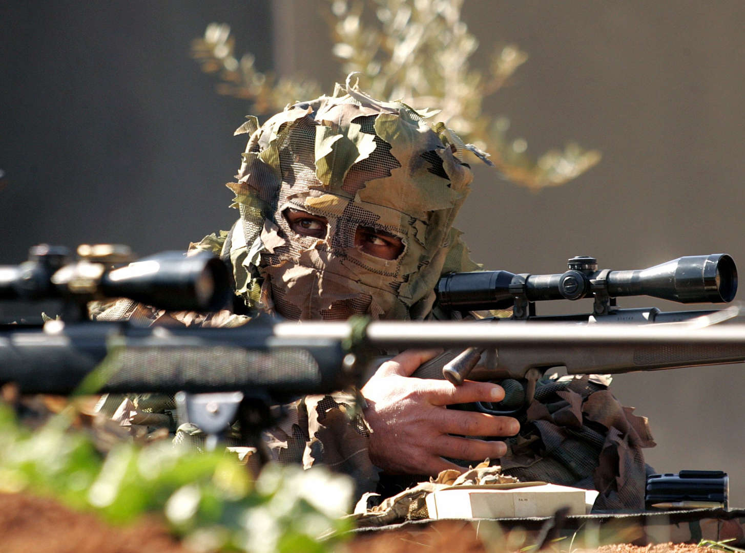 Iraqi police officer takes part in a graduation ceremony after their course in Amman, Jordan February 23, 2006. A two-year U.S. funded programme to train Iraqi elite counter-terrorism forces in Jordan ended on Thursday after the scheme moved to Iraq, officials said. They said 77 trainees graduated on Thursday, bringing a total of over 700 special counter-terrorism forces who have trained in the kingdom's top anti-terrorism training headquarters since late 2003.