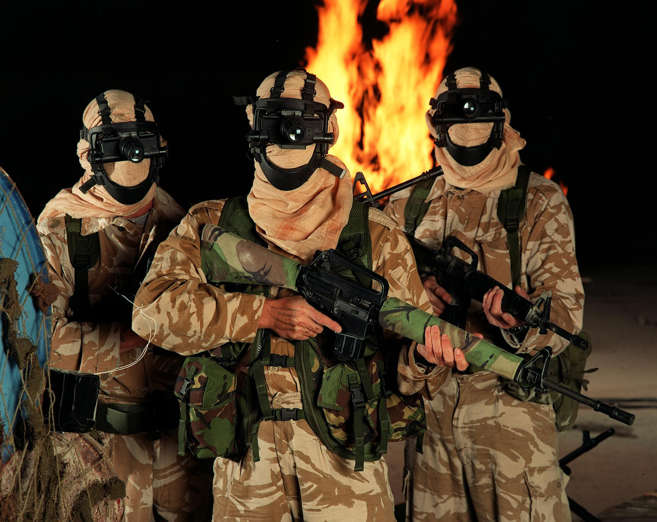 HERTFORDSHIRE - SEPTEMBER:  Serving members of the Elite SAS regiment in a reconstruction filmed at a cement works in Hertfordshire, UK, for a drama programme based on the Iranian embassy seige, September 2000.  (Photo by
