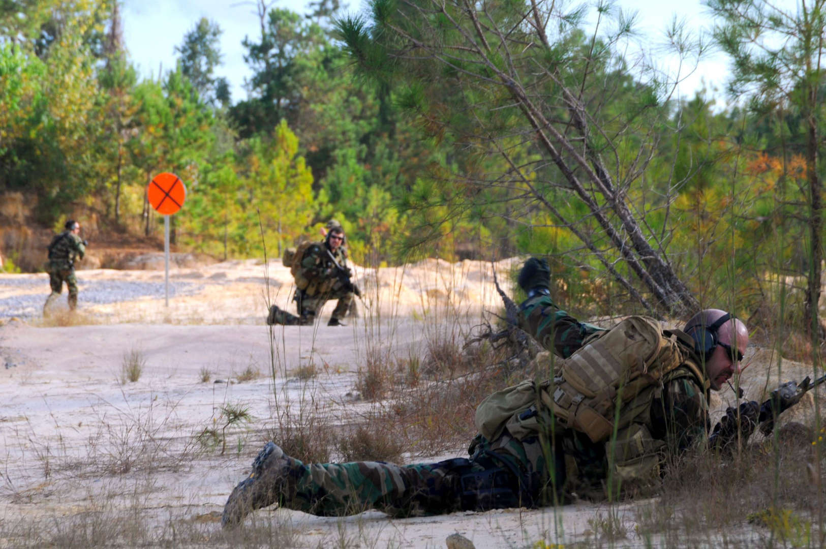 STENNIS SPACE CENTER, MS - OCTOBER 25:  (EDITORS NOTE: Image has been reviewed by U.S. Military prior to transmission.) In this handout provided by the U.S. Navy, Navy SEALs conduct immediate action drills October 25, 2010 at the John C. Stennis Space Center, Mississippi. The drills are a part of the SEALs pre-deployment training. Navy SEALs are the maritime component of U.S. Special Operations Command and are trained to conduct a variety of operations from the sea, air and land. (Photo by