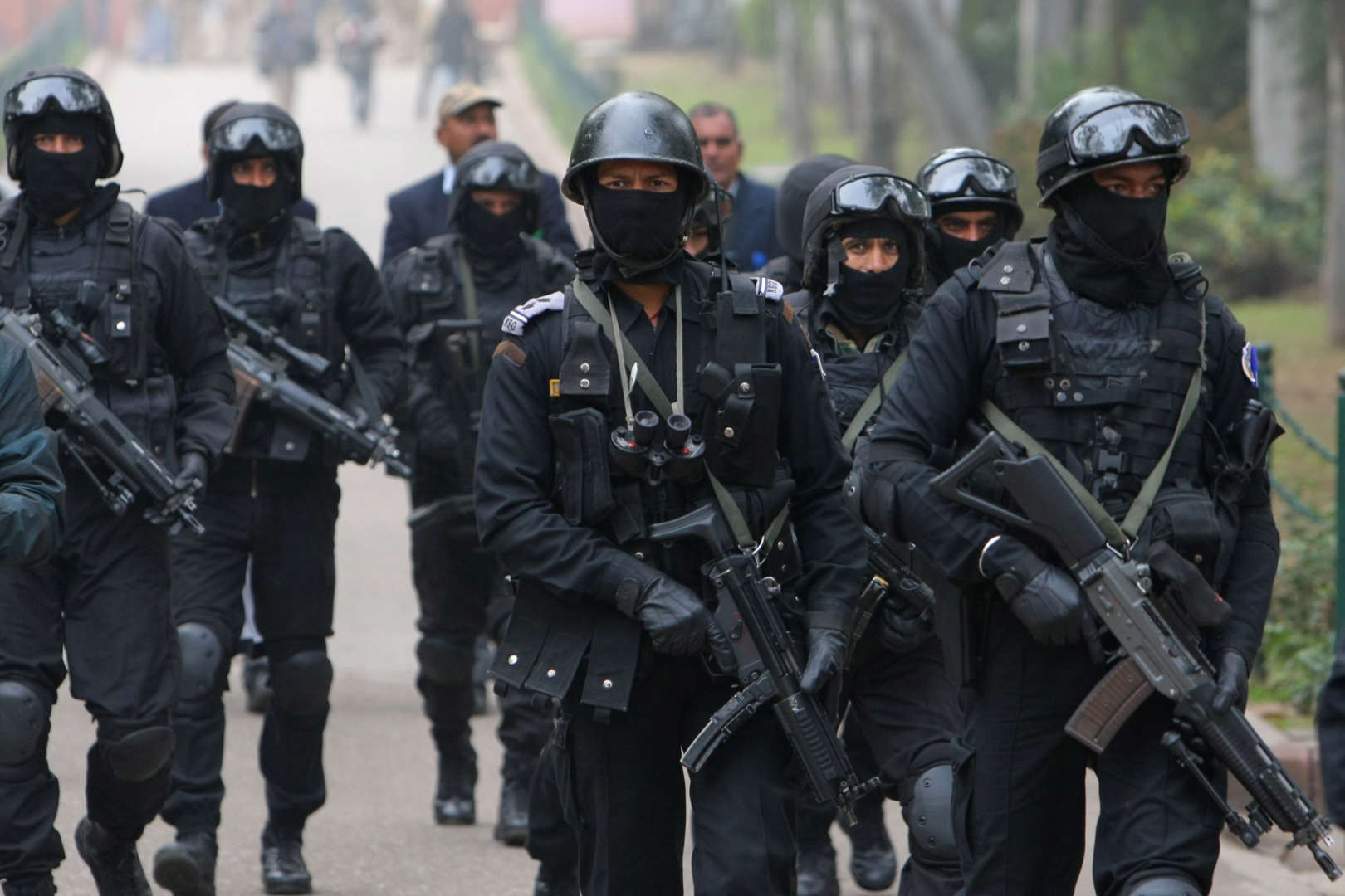 Indian National Security Guard (NSG) commandos arrive to provide security ahead of US President Barack Obama's arrival at Raj Ghat, the memorial for India's independence icon Mahatma Gandhi, in New Delhi on January 25, 2015. US President Barack Obama held talks January 25 with Prime Minister Narendra Modi at the start of a three-day India visit aimed at consolidating increasingly close ties between the world's two largest democracies.