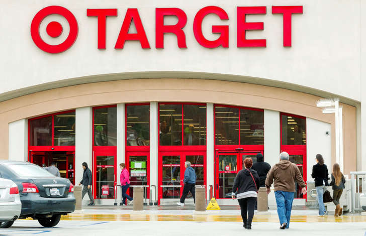 In this Dec. 19, 2013, file photo, shoppers arrive at a Target store in Los Angeles. Target has proposed to pay $10 million to settle a class-action lawsuit brought against it following a massive data breach in 2013.