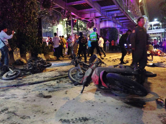 Motorcycles are strewn about after the explosion.