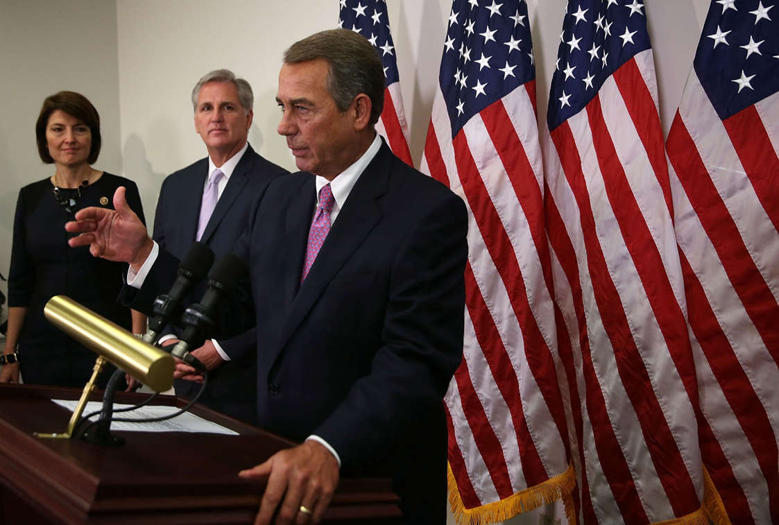 U.S. Speaker of the House Rep. John Boehner (R-OH) (R) speaks as House Majority Leader Rep. Kevin McCarthy (R-CA) (2nd L) and Rep. Cathy McMorris Rodgers (R-WA) (L) listen during a news briefing after a House Republican Caucus meeting October 27, 2015 at the Capitol in Washington, DC.