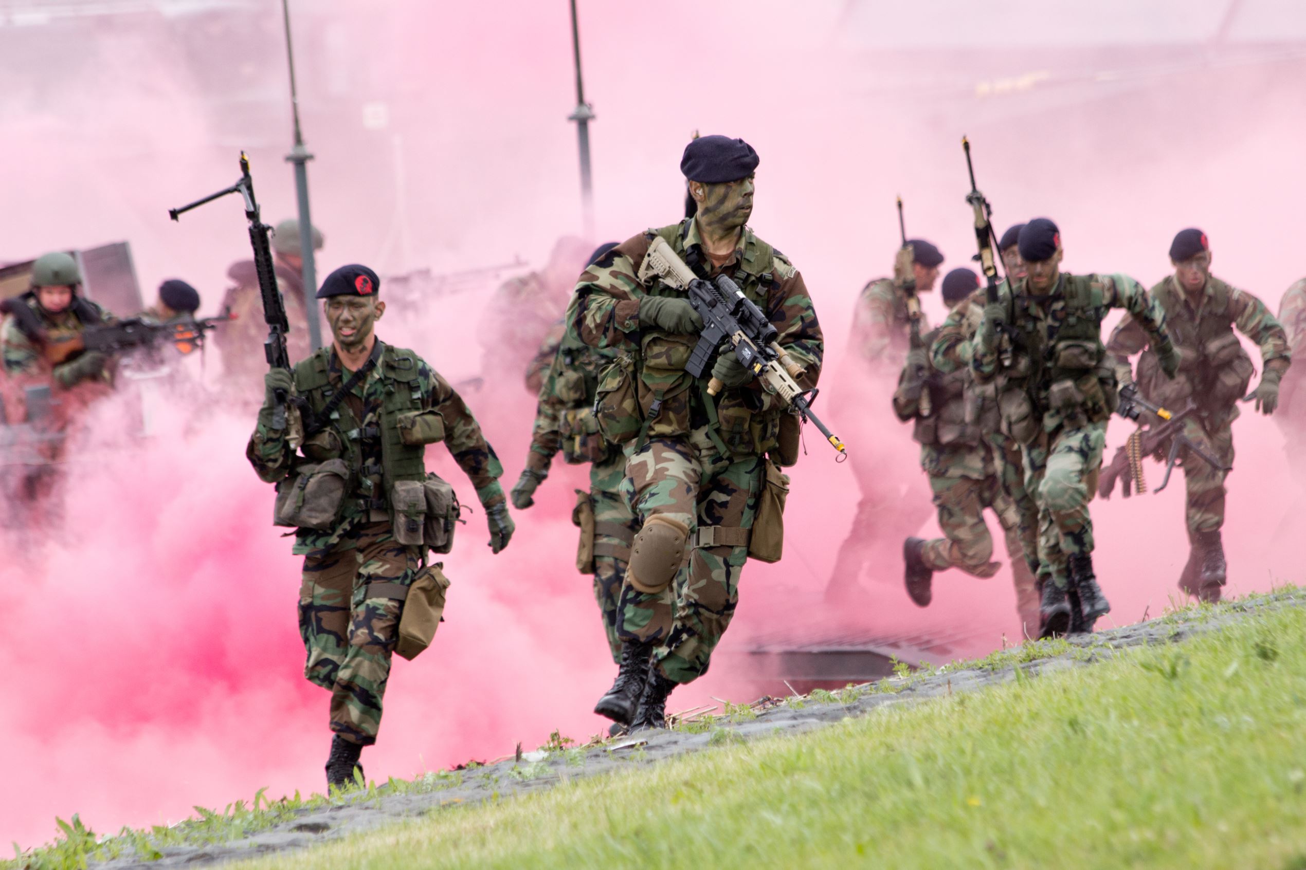 Dutch Marines disembark a landing craft at an amphibious assault demo during the Dutch Navy Day.