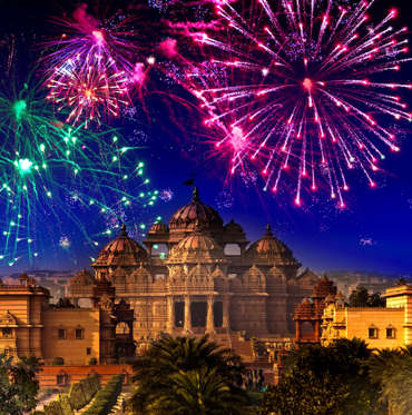 Festive firework over temple Akshardham, India. Delhi.