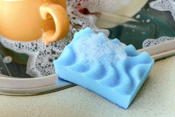 Sponge Cleaning Dishes.