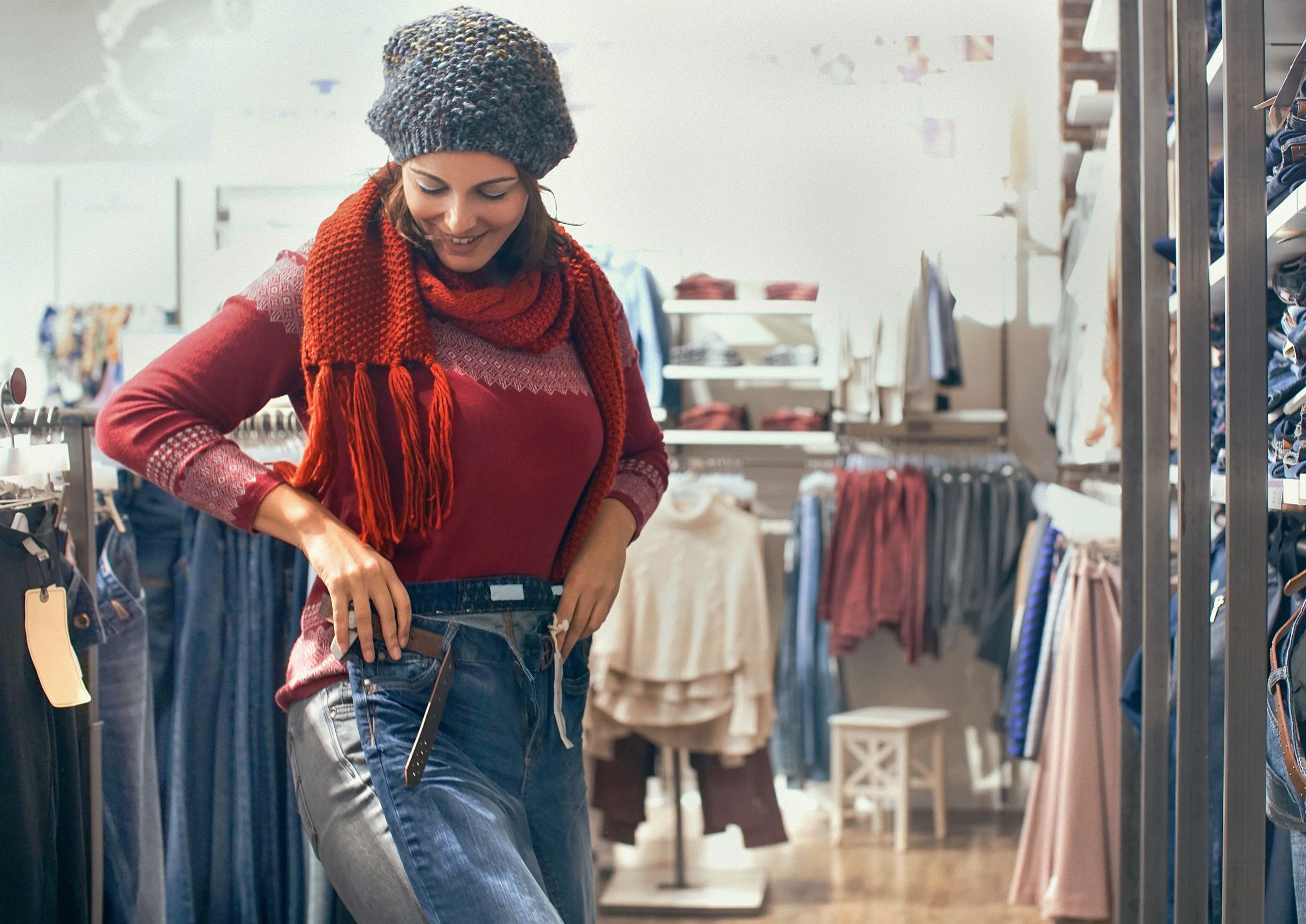 Woman Trying New Jeans at a Retail Store.