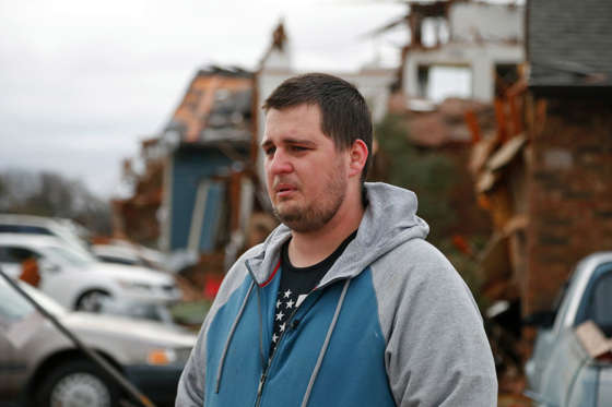 Josh White, 25, a resident at Landmark at Lake Village North Apartments gets emotional recounting how he lived through the event as the recovery process begins following tornadoes which hit the area late Saturday night December 28, 2015 in Garland, Texas. A meteorolocical assault of tornadoes, blizzards and heavy rain have left dozens dead and a large path of property damage in the Central, U.S.