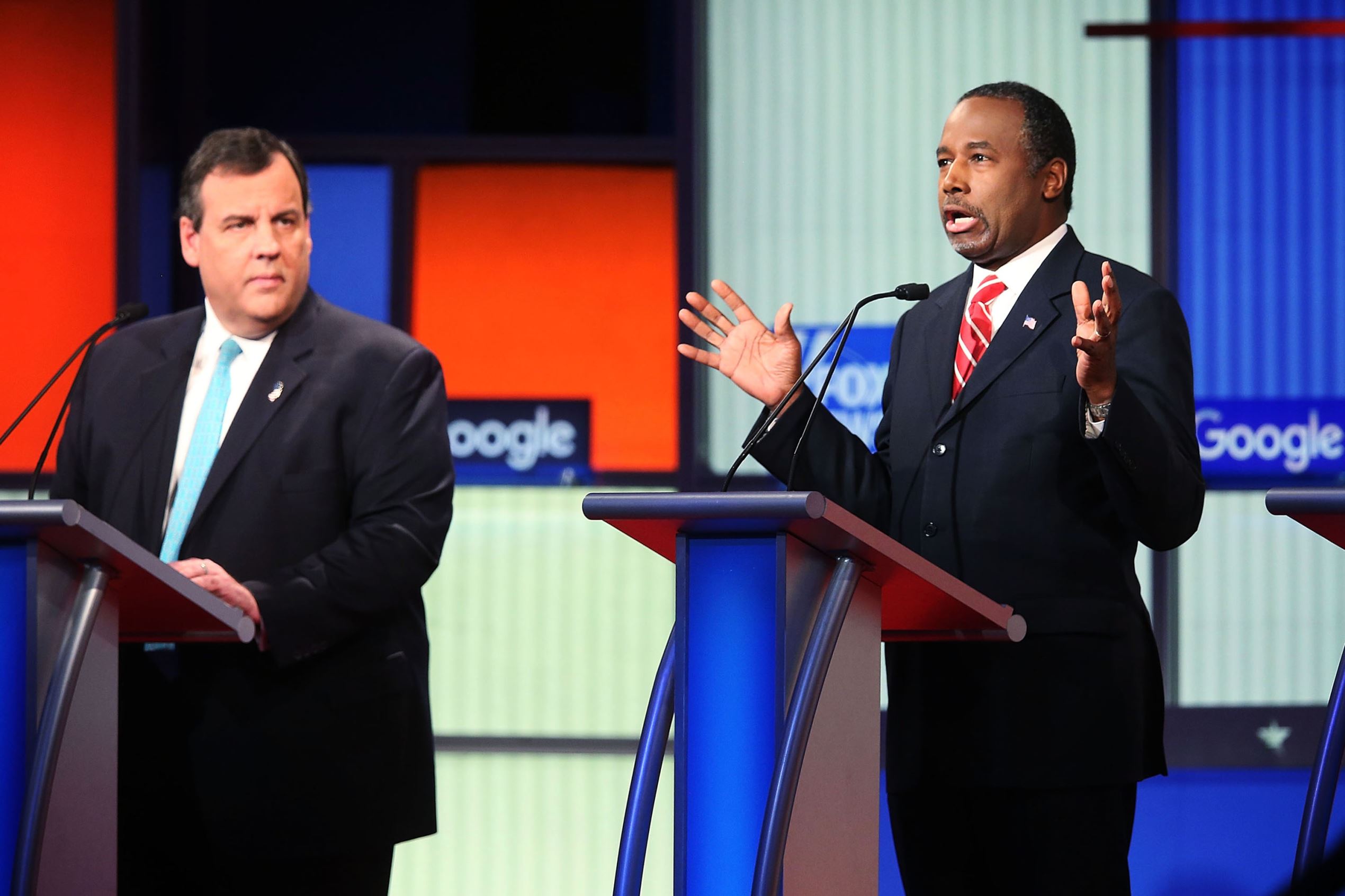 Republican presidential candidates (R-L) Ben Carson and New Jersey Governor Chris Christie participate in the Fox News - Google GOP Debate January 28, 2016 at the Iowa Events Center in Des Moines, Iowa.