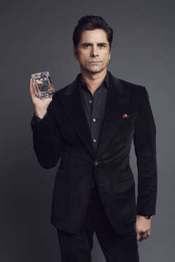 Actor John Stamos poses for a portrait at the 2016 People's Choice Awards at the Microsoft Theater on January 6, 2016 in Los Angeles, California.