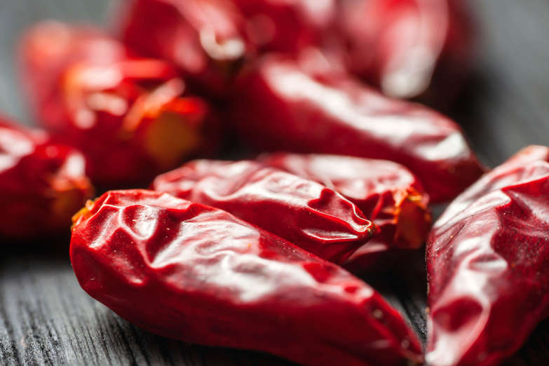 This invigorating spice has an exotic reputation and a bright red color, which could be why it's considered an aphrodisiac and a symbol of love. But there's scientific backing, too. Chili peppers stimulate endorphins (the brain's feel good chemicals), speed up heart rate and make you sweat, which all mimic how you feel when you're aroused, Dr. Meryl S. Rosofsky told the New York Times.