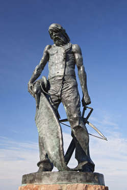 Statue of the Ancient Mariner in Watchet harbour, created as a tribute to Samuel Taylor Coleridge, whose poem 'The Rime of the Ancient Mariner' was written whilst in the Watchet area. (Photo by: Loop Images/UIG via Getty Images)