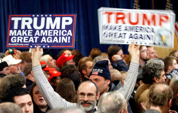 Supporters wait for Republican presidential candidate, businessman Donald Trump to speak during a primary night rally, Tuesday, Feb. 9, 2016, in Manchester, N.H.