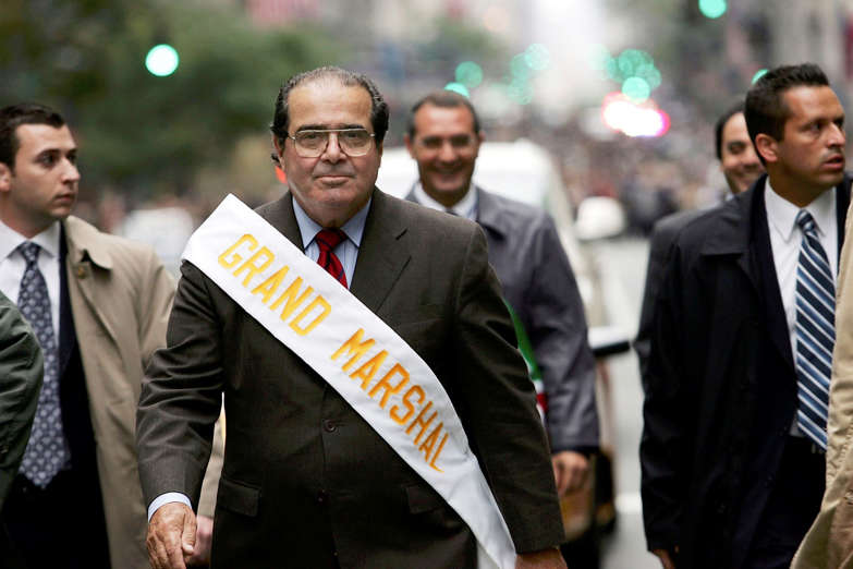 Surrounded by security, Supreme Court Justice Antonin Scalia walks October 10, 2005 in the annual Columbus Day Parade in New York City. This is the 61st Columbus Parade which celebrates both the explorer and Italian cultural influence on America.