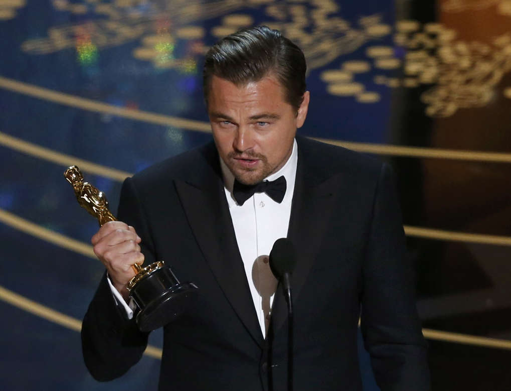 <span style="color:#666666;font-family:'Segoe UI', 'Segoe WP', Arial, sans-serif;font-size:13px;line-height:17.992px;"> Leonardo DiCaprio accepts the Oscar for Best Actor for the movie "The Revenant" at the 88th Academy Awards in Hollywood, California February 28, 2016. REUTERS/Mario Anzuoni</span>