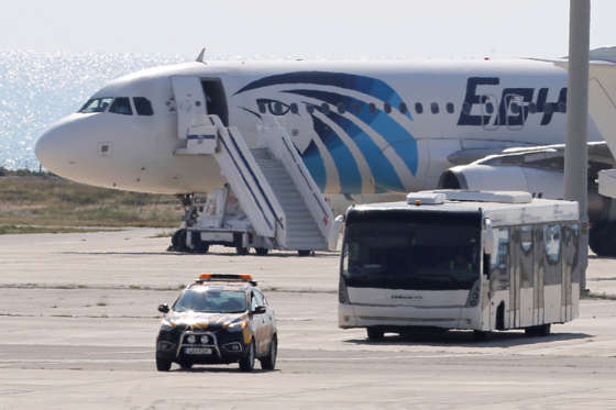 A bus carrying some passengers from the hijacked EgyptAir aircraft as it landed at Larnaca airport Tuesday, March 29, 2016.