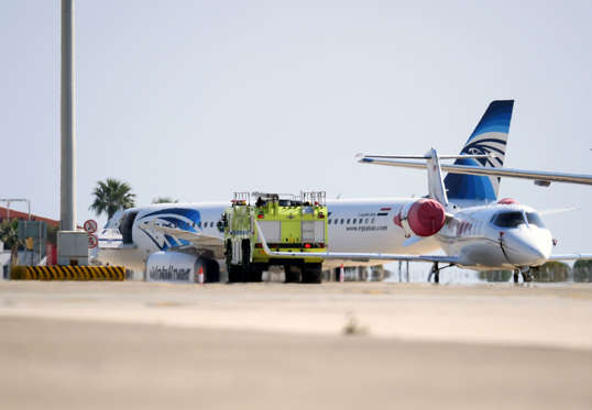 An EgyptAir Airbus A-320 sits on the tarmac of Larnaca aiport after it was hijacked and diverted to Cyprus on March 29, 2016. A hijacker seized the Egyptian airliner and diverted it to Cyprus, before releasing all the passengers except four foreigners and the crew, officials and the airline said. / AFP / GEORGE MICHAEL (Photo credit should read GEORGE MICHAEL/AFP/Getty Images)