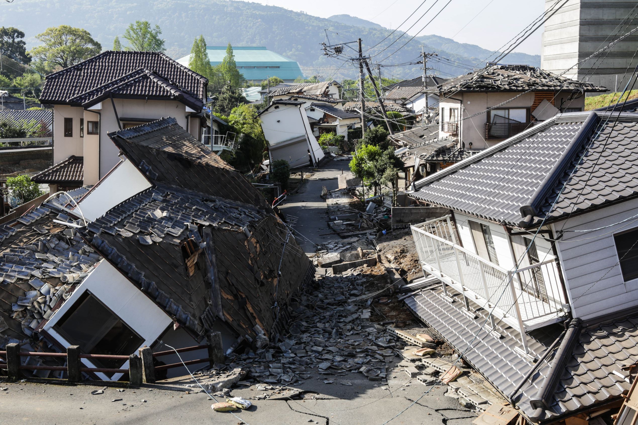 Houses are seen destroyed after a recent earthquake on April 16, 2016 in Kumamoto, Japan.